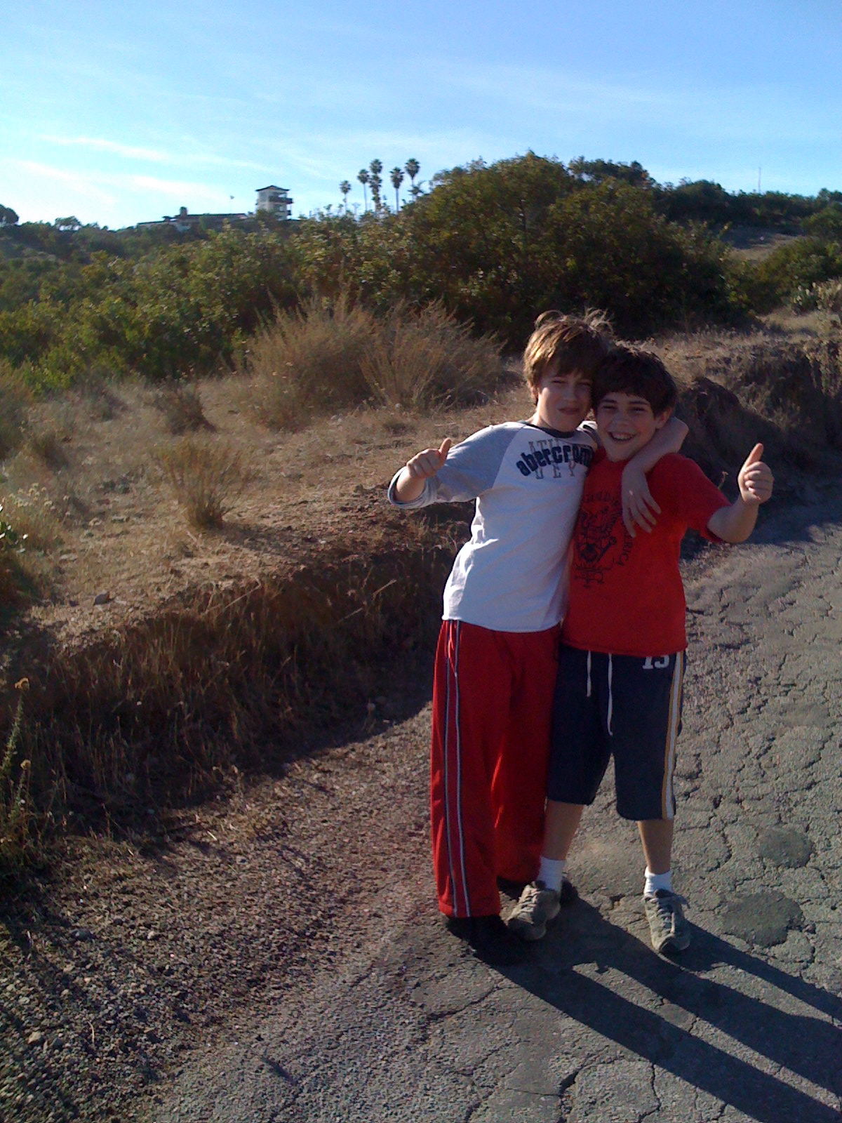 Rudy and Dexter, airport in the background 2009
